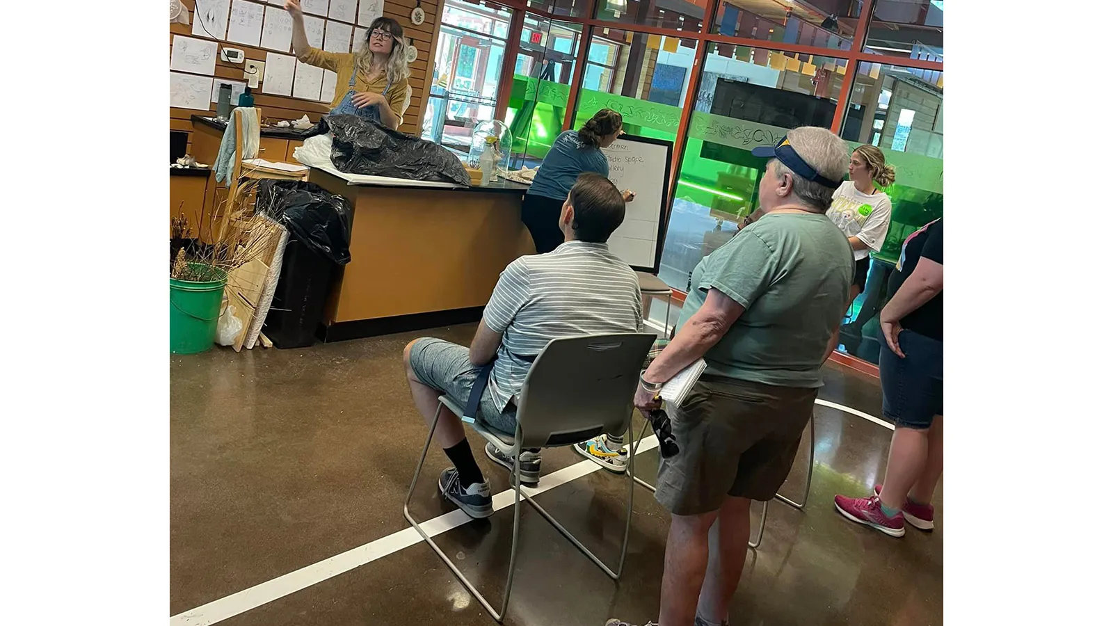 Aphasia clients helping at store