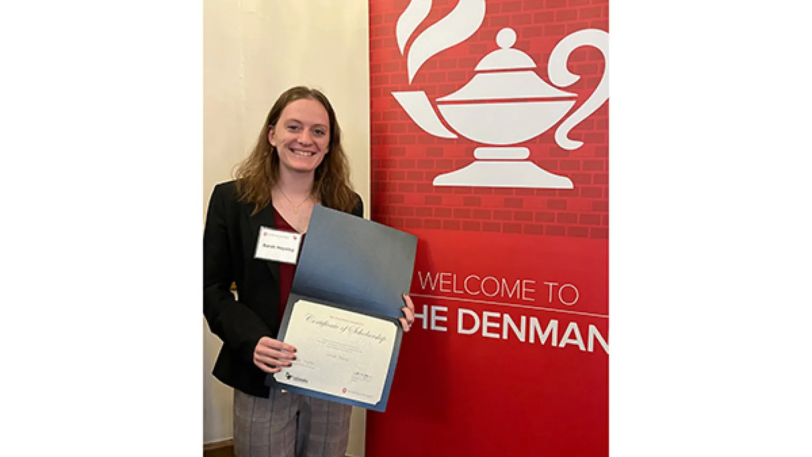 Sarah Haysley receiving award