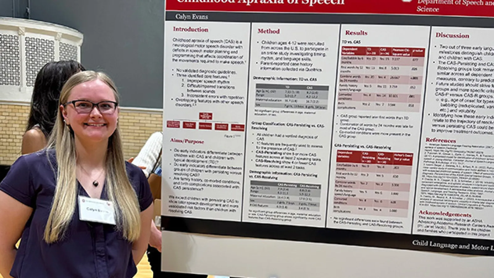 Calyn Evans with research poster
