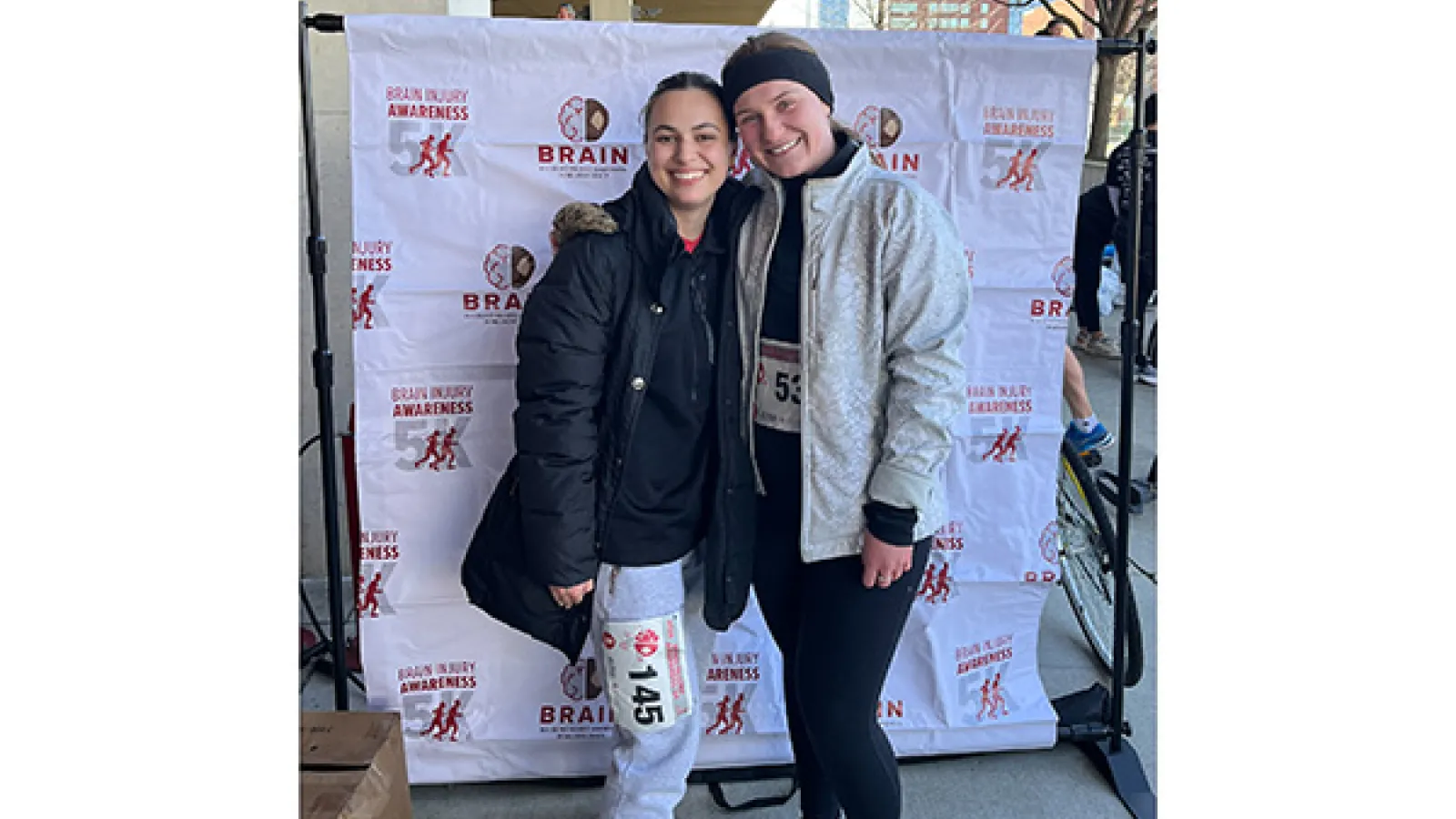 Natlie Freitag and Grace Terry posing at 5K