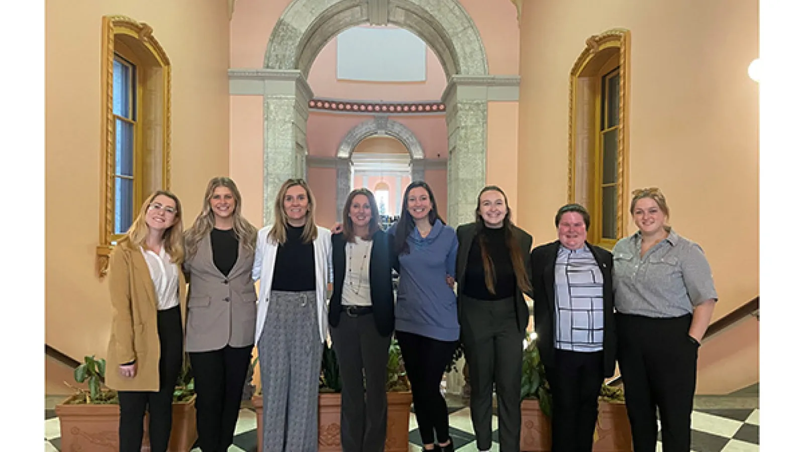6 students and 2 faculty in statehouse