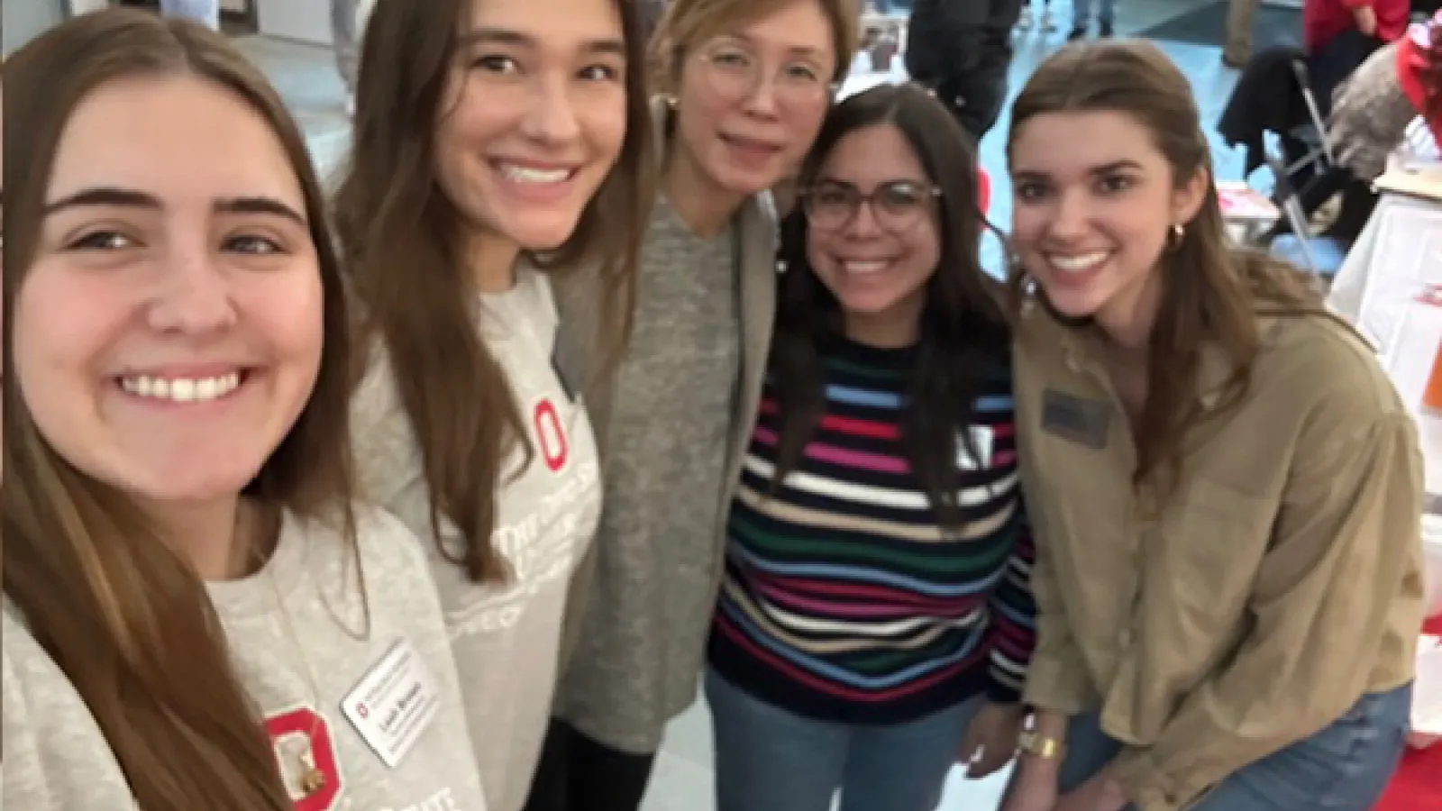 Group selfie of students, faculty, and staff