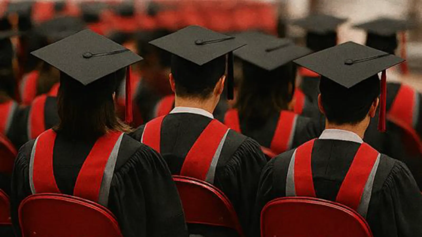 students in commencement regalia