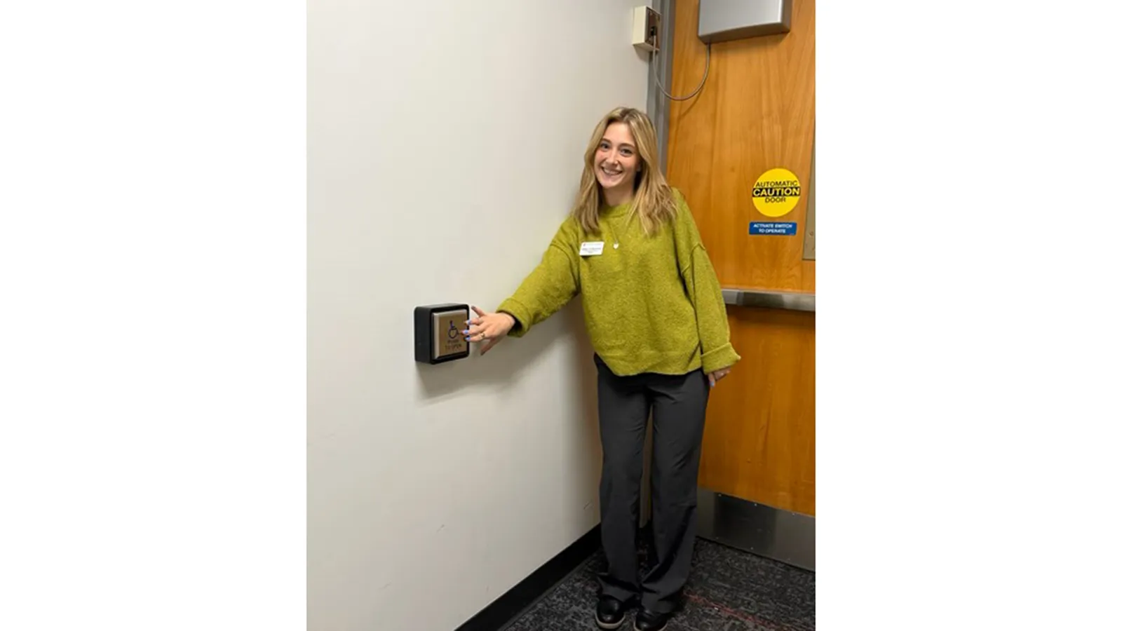 Abby demonstrating automatic door opener