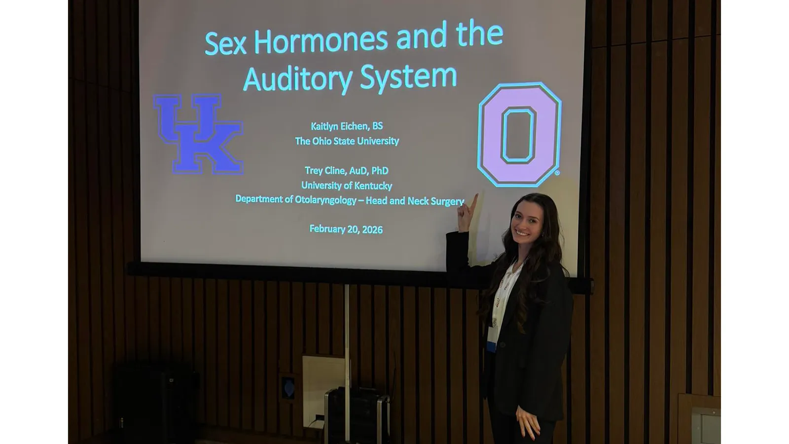 Kaitlyn Eichen presenting in front of screen