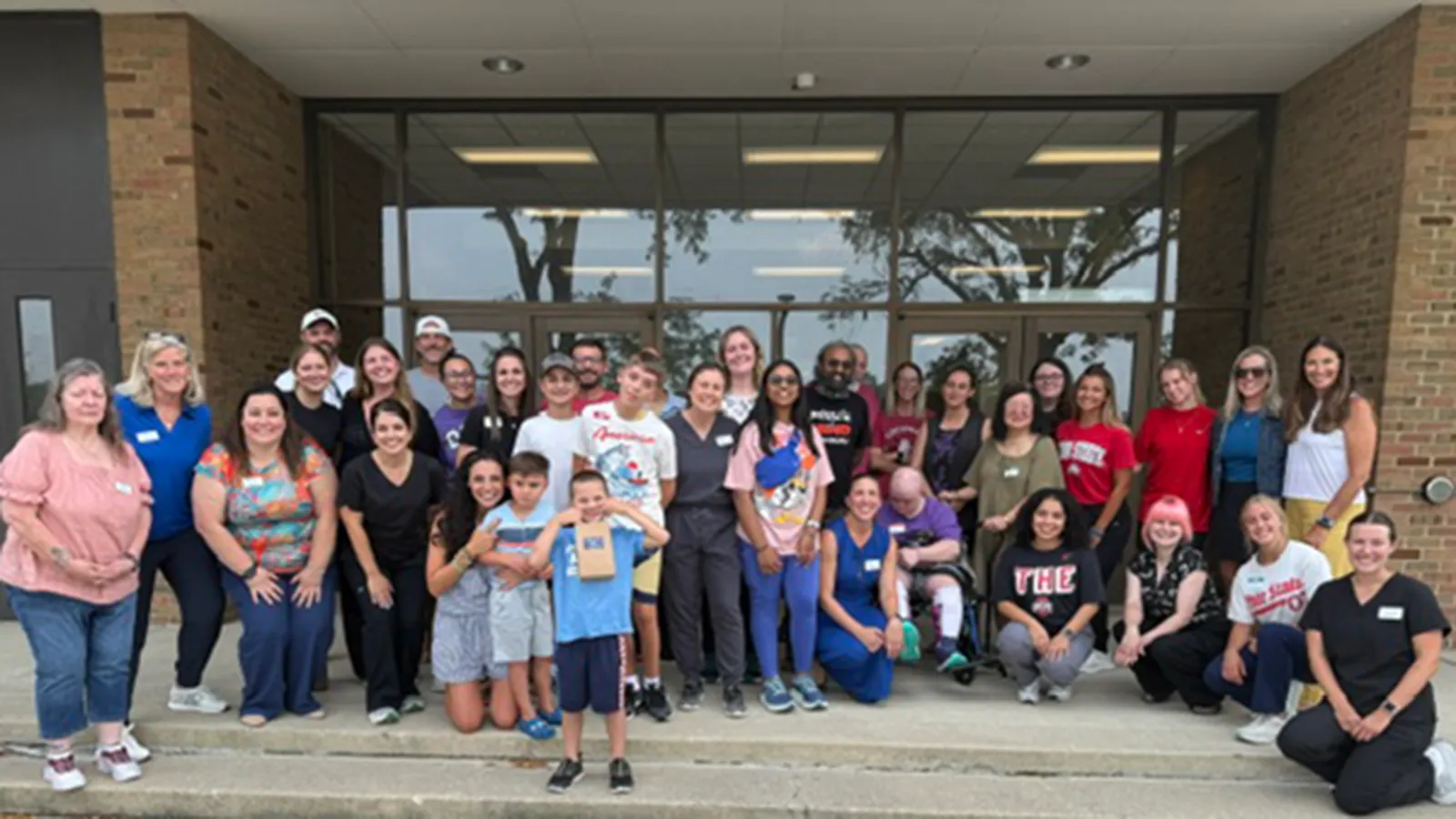 Large group photo of people of all ages