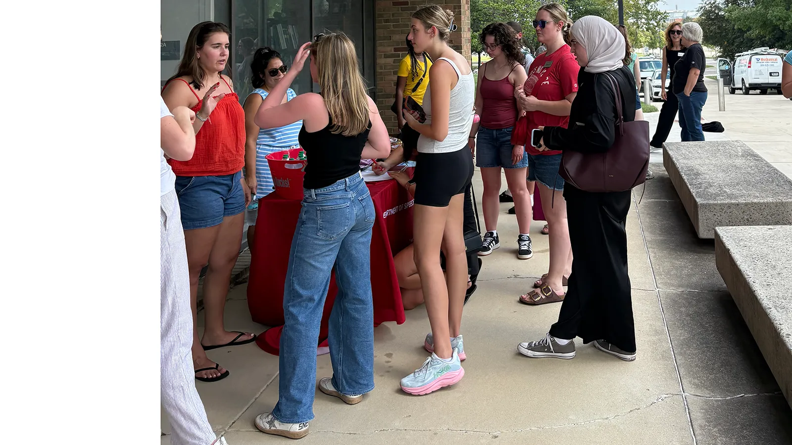 students mingling at outdoor event