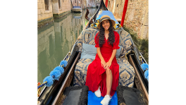 Vania in a gondola on a canal