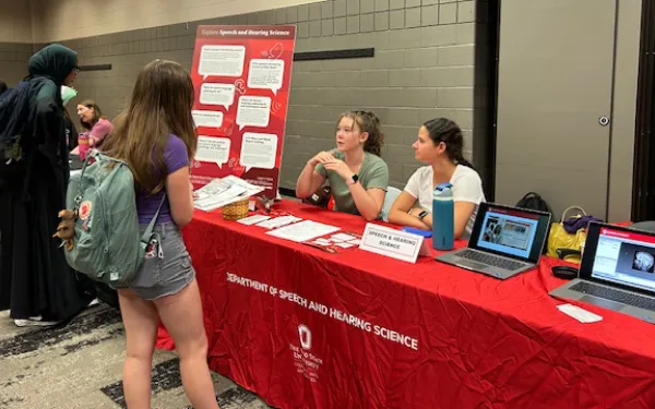 Students visiting information table