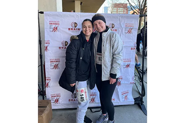 Natlie Freitag and Grace Terry posing at 5K