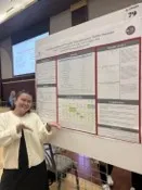 Grace Silvers presenting research poster