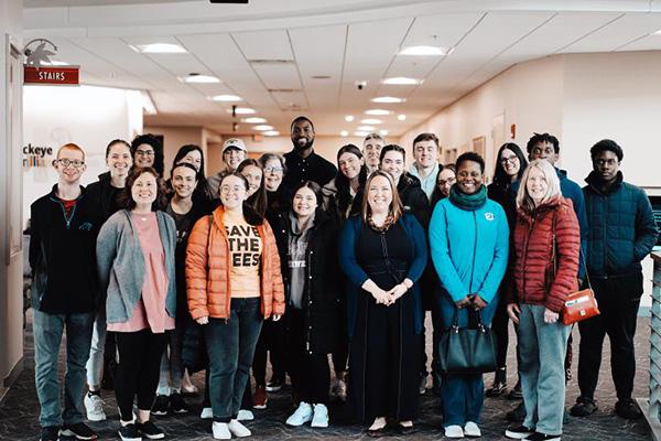 Group photo of students with Michael Kidd-Gilchrist