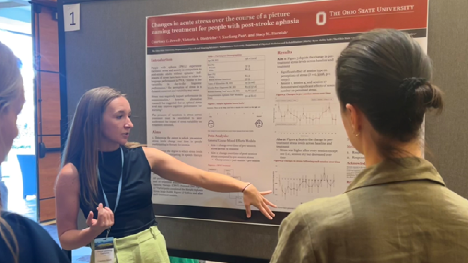 Courtney Jewell presenting research poster