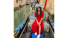 Vania in a gondola on a canal