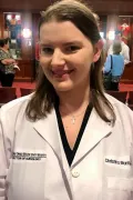 Christina Martin-Smith in white coat